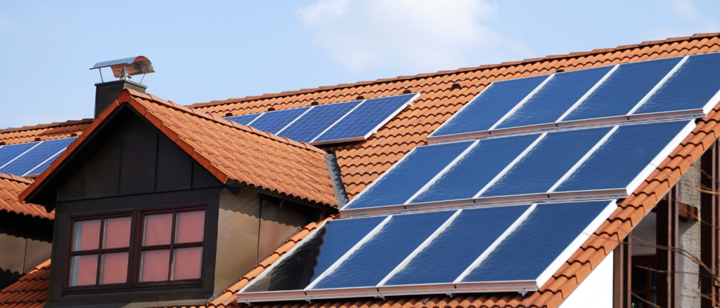 Defender Pest Control showing a solar panel array on the roof of a residential property